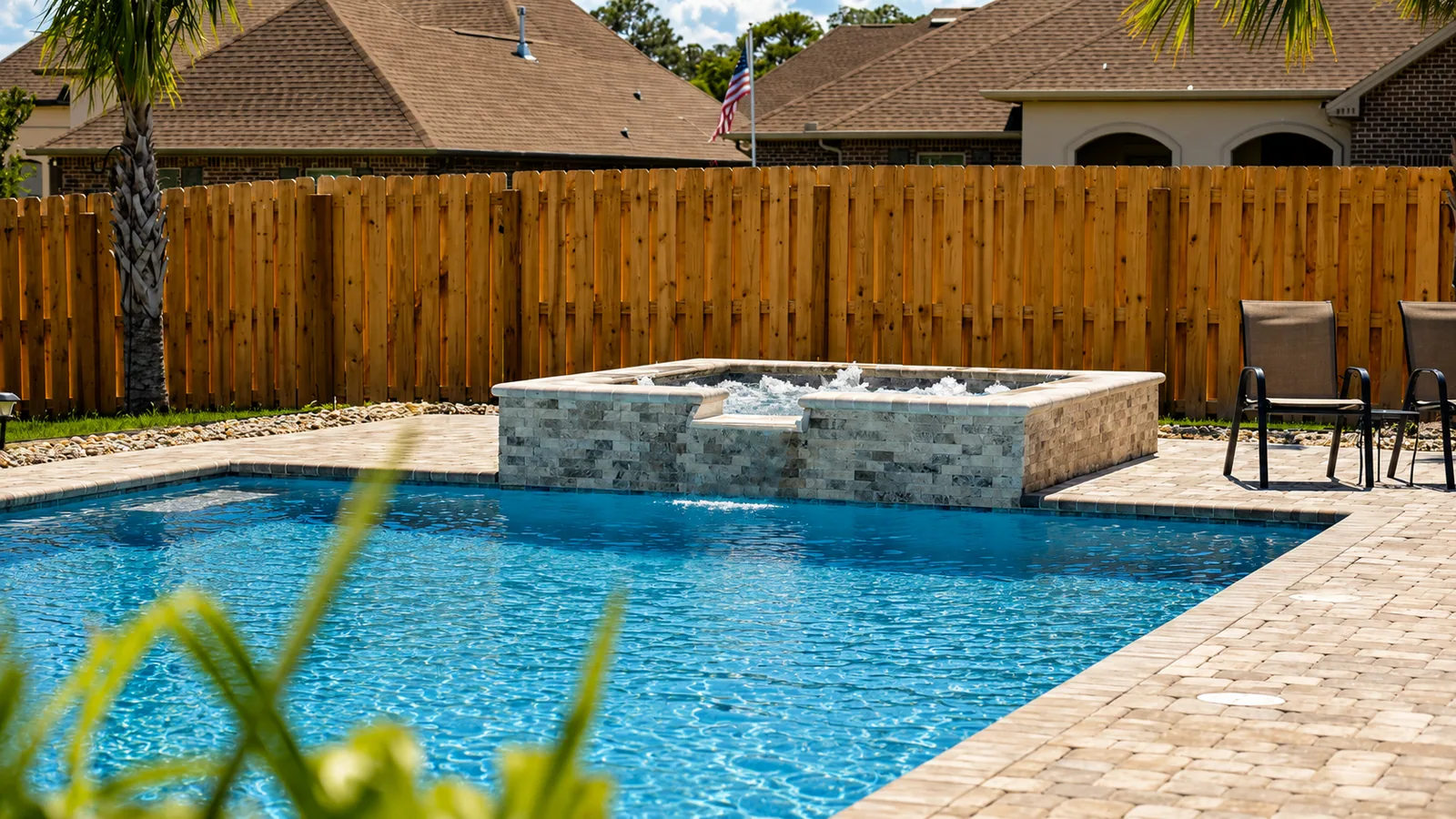 gd Finished Neway Pools backyard with patio living space