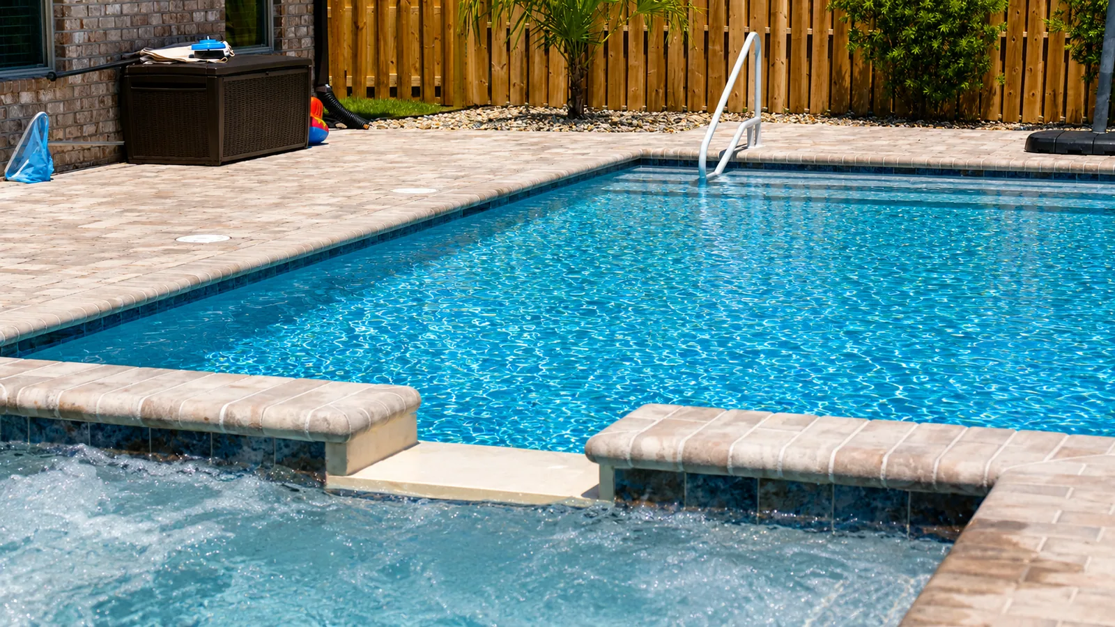 Pool coping and paver decking detail on a custom Neway pool Pool coping and paver decking detail on a custom Neway pool