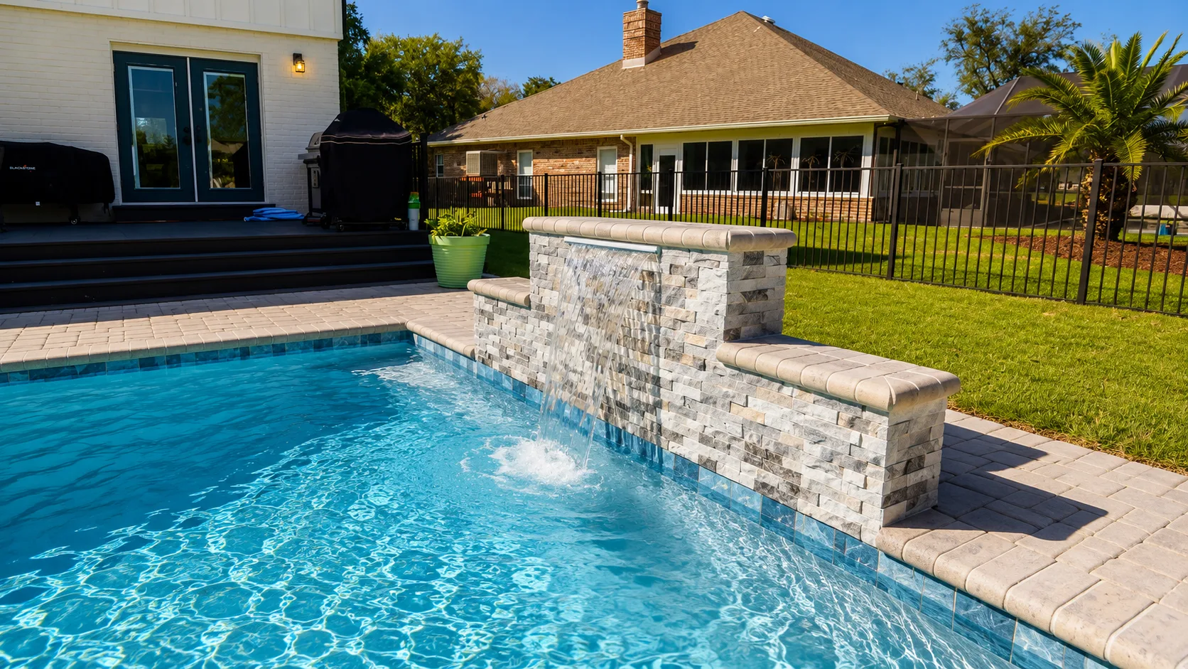 Pool coping and paver decking on a custom Neway pool