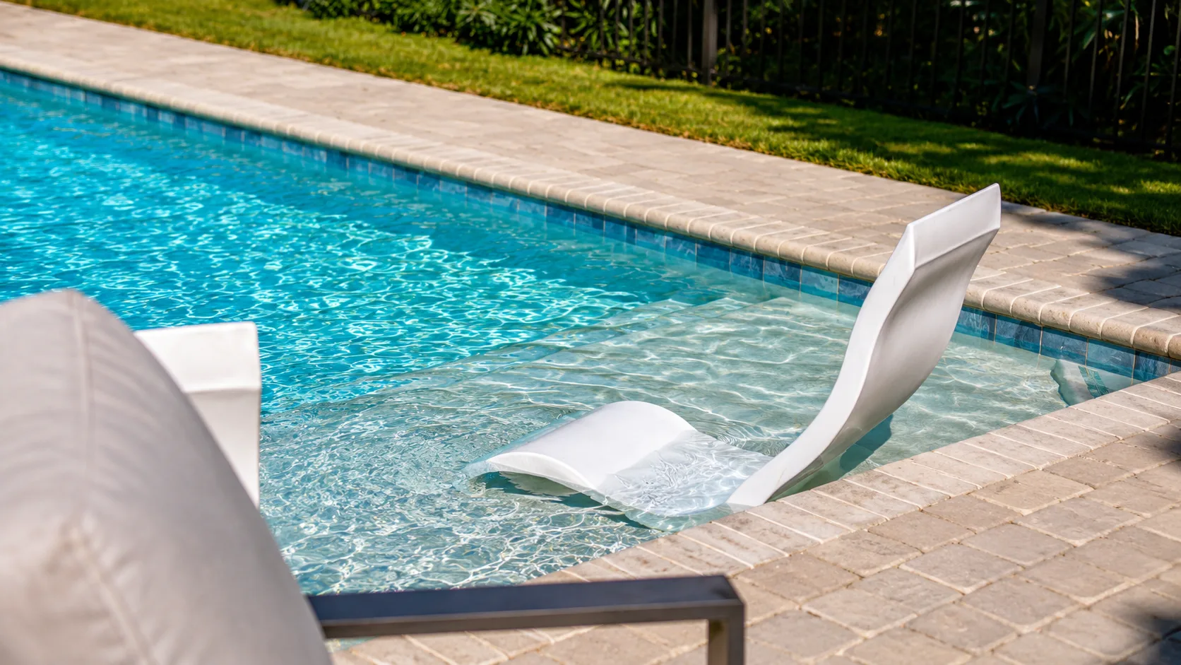 Water feature on a completed Neway Pools swimming pool