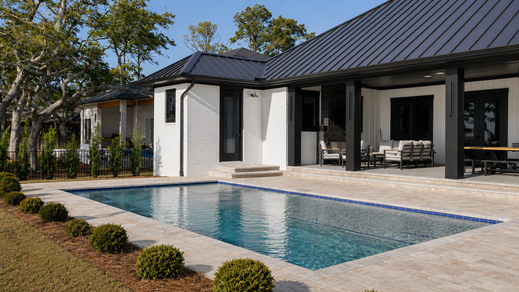 Modern home with a custom rectangular swimming pool by Neway Pools Modern home with a custom rectangular swimming pool by Neway Pools